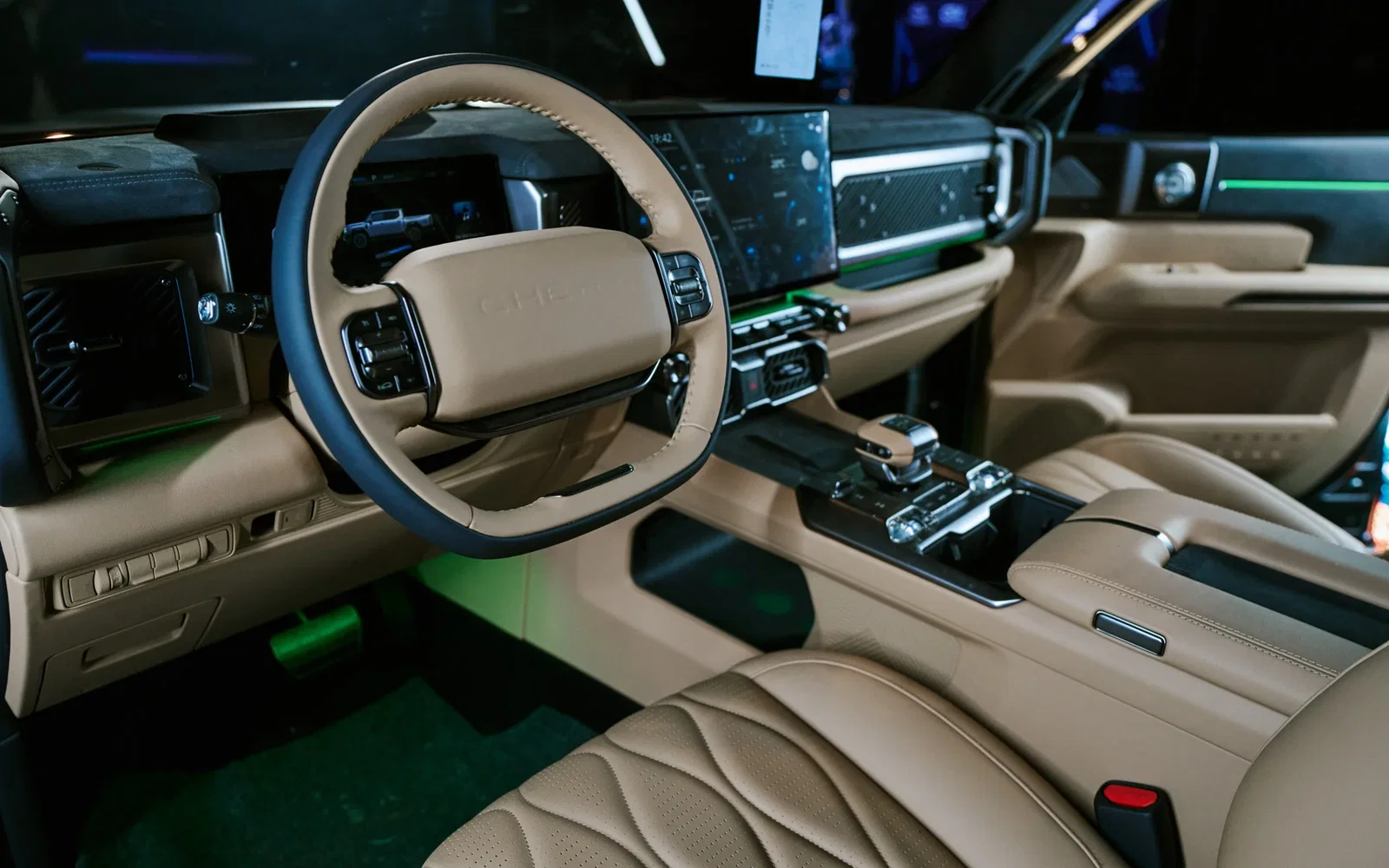 Chery KP31 interior showing leather-trimmed dashboard, steering wheel, and centre console