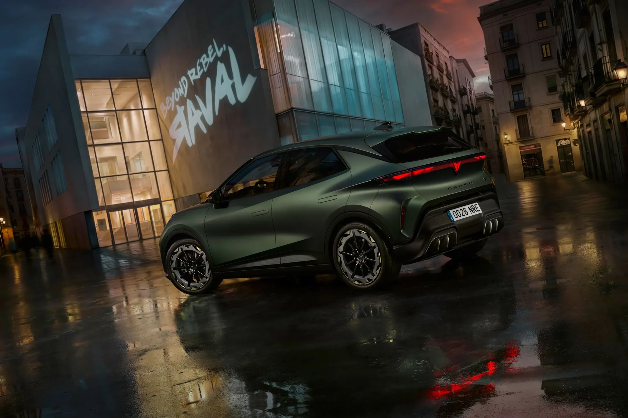 2026 Cupra Raval rear three-quarter view at night in Barcelona