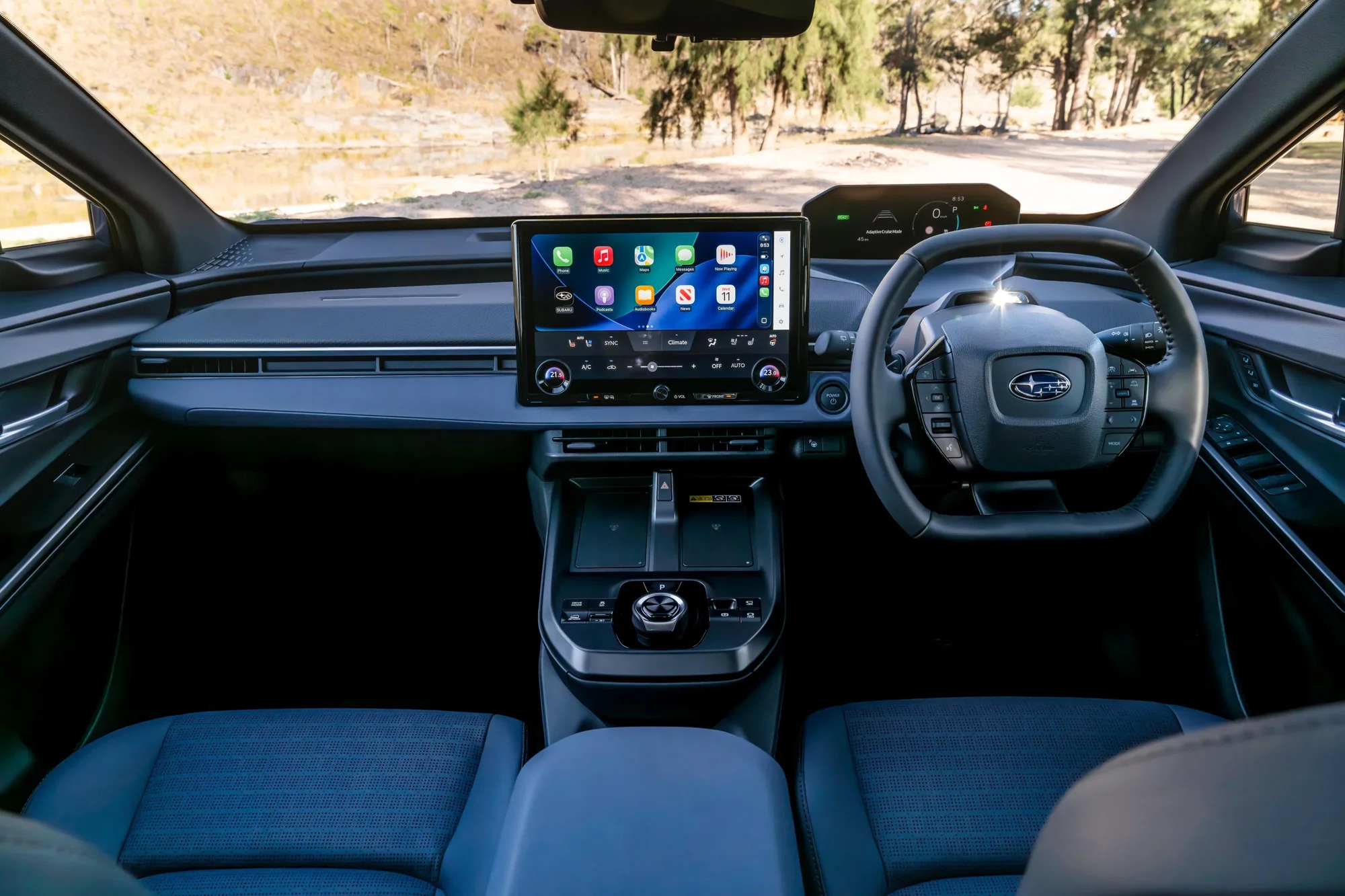 Subaru Trailseeker interior showing 14-inch touchscreen and leather-wrapped steering wheel
